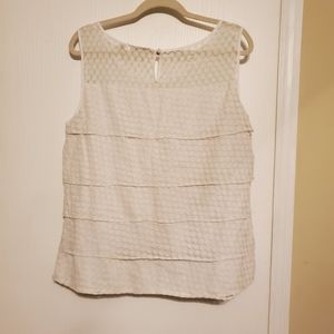 White sleeveless blouse